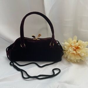 VALERIE STRVENS Burgundy soft velvet bag elegant sophisticated With gold closure
